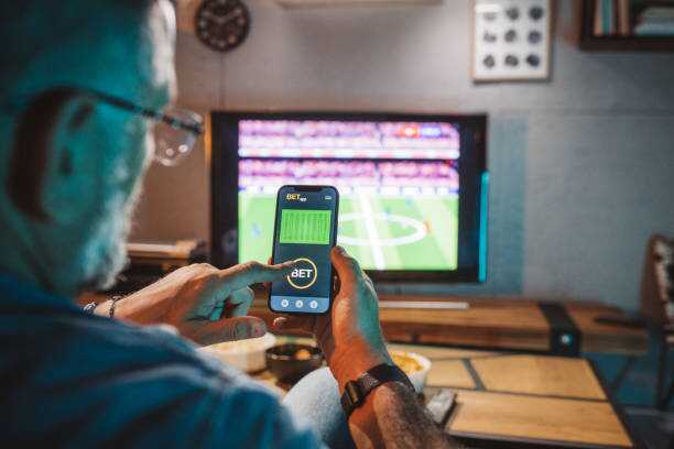 watching soccer game at home